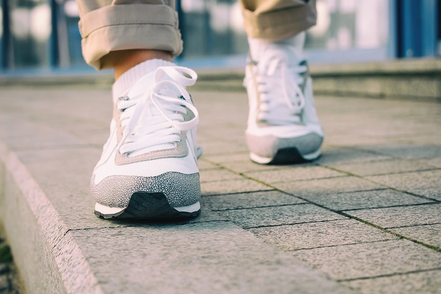 Person walking on pavement